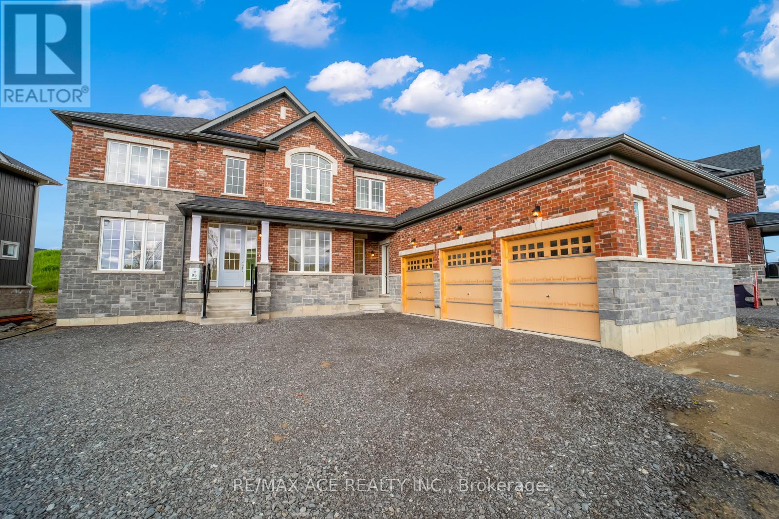 A large house with a garage is for sale.