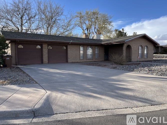 A house with a driveway in front of it.