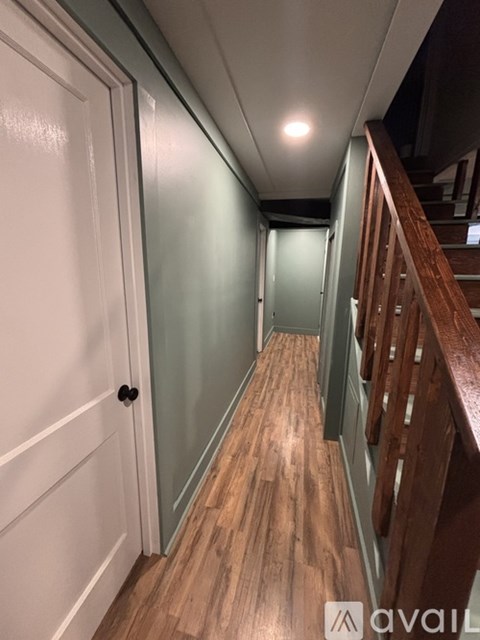 A room with a washer and dryer in it.