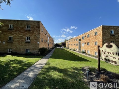 A flyer advertises an open house at Epworth Apartments on Saturday, April 11, 2026 from 12:00 PM to 2:00 PM.