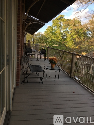 A patio with a table and chairs is available for rent.