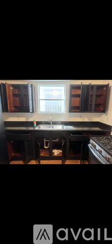 A kitchen with a window and a sink.