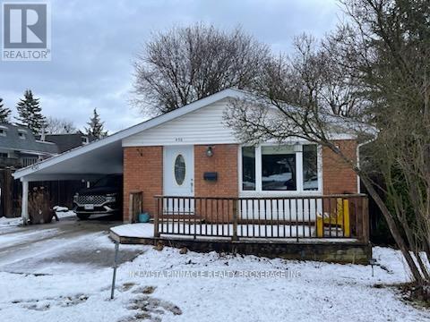 A house with a white door and a porch.