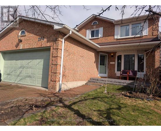 A brick house with a garage door and a sign that says "HOMELIFE KINGSVIEW REAL ESTATE INC Brokerage".
