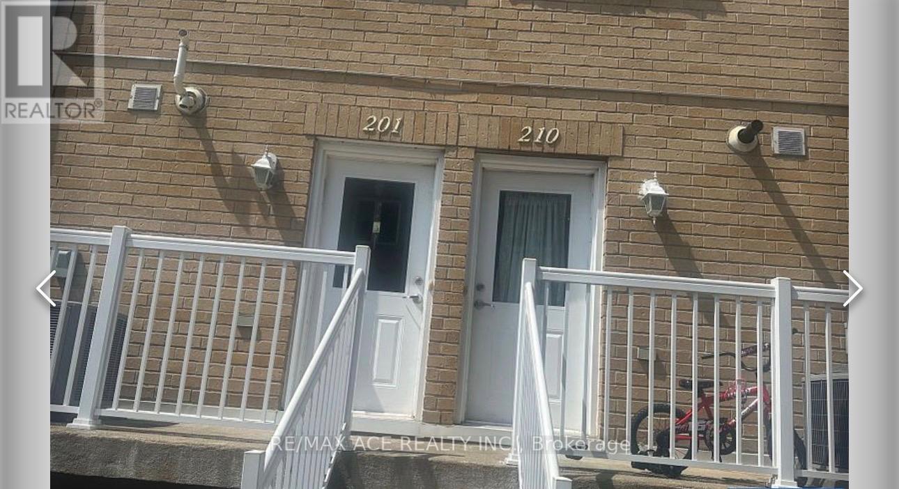 A building with the number 210 on it.