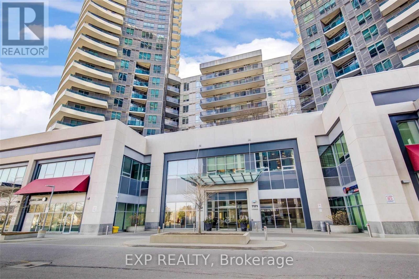 A building with the text EXP REALTY, Brokerage in front of it.