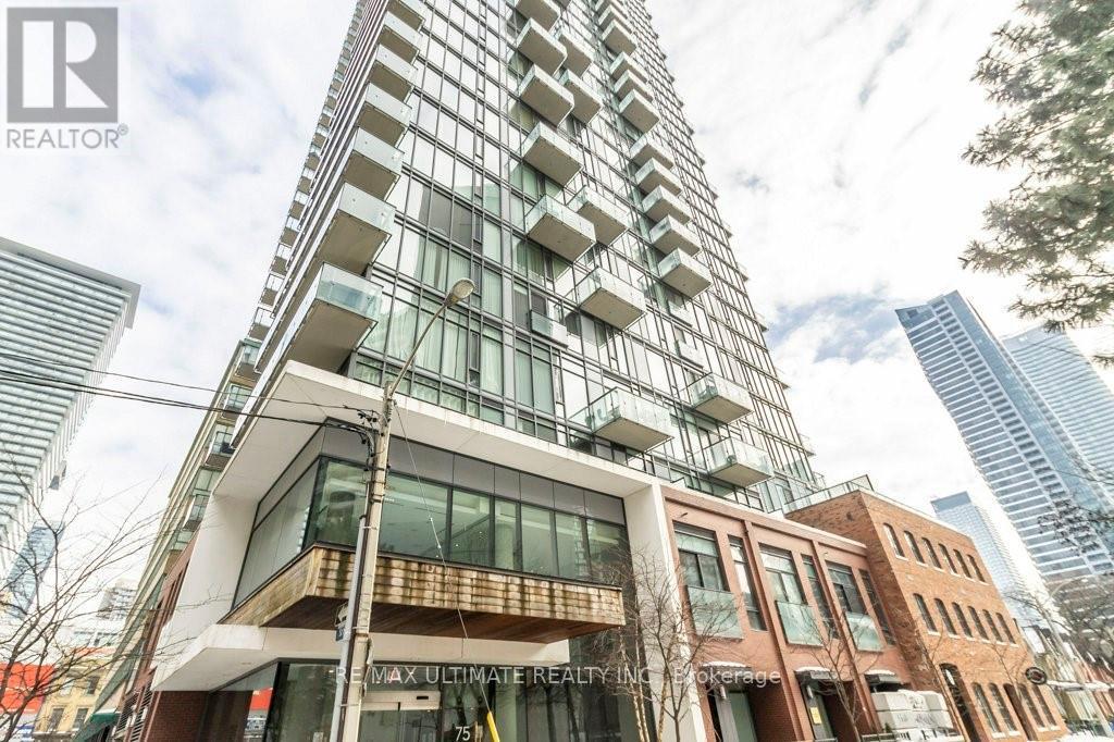 A tall building with a balcony is in the foreground.