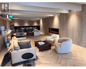 A modern living room with a fireplace and comfortable seating.