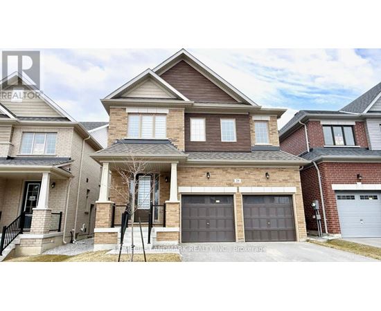 A large house with a garage is for sale.