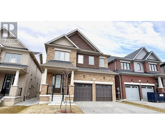 A row of houses with garages and driveways.
