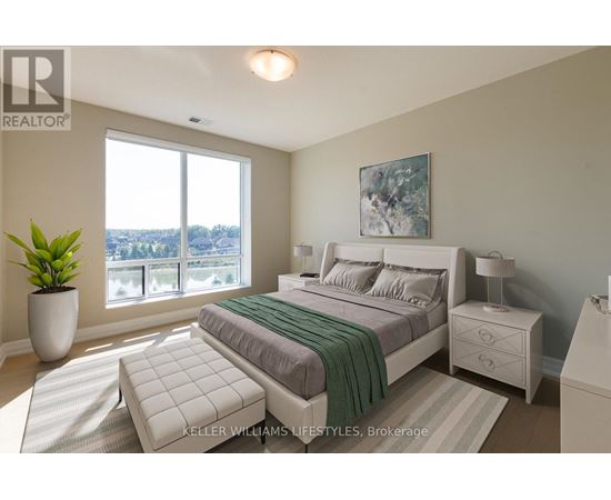 A bedroom with a large bed, a nightstand, and a window overlooking a cityscape.