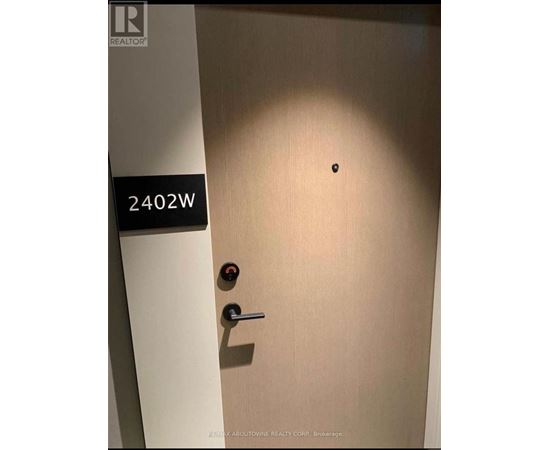 A door with a sign that says 2402W on it.
