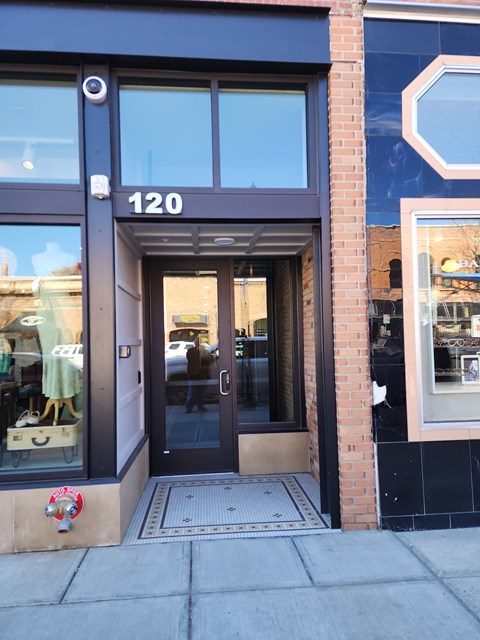 The front of a building with the number 120 on it.
