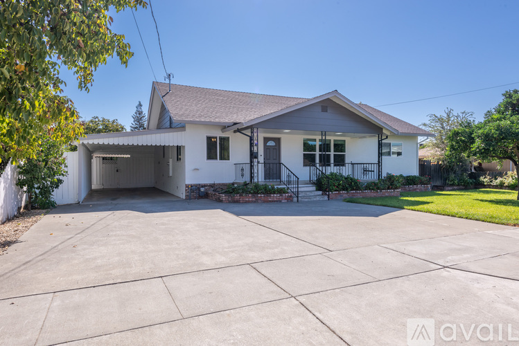 A house with a garage is available for sale.