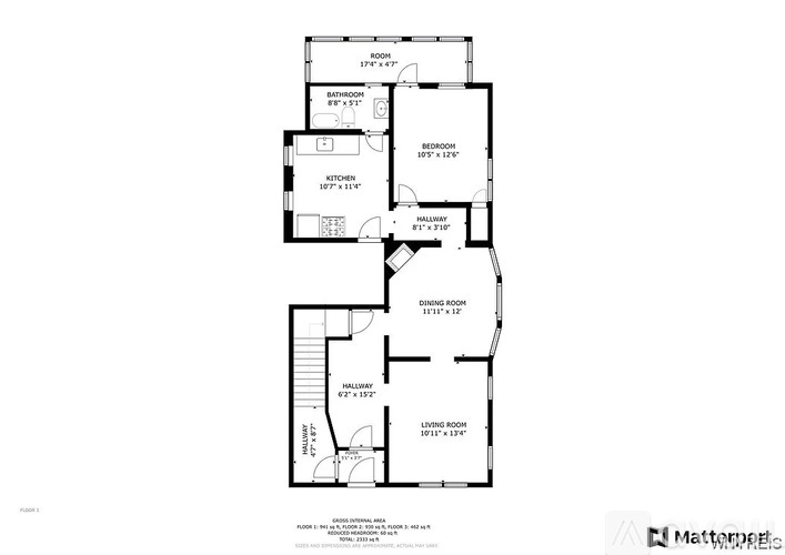 A floor plan of a house with a garage and a living room.