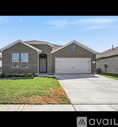 A two-story house with a garage is for sale.