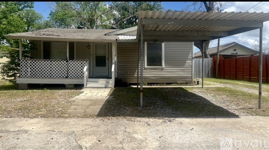 A house with a covered patio area.