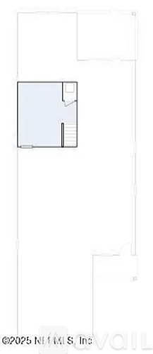 A floor plan of a small apartment with a bedroom, living room, and kitchen.