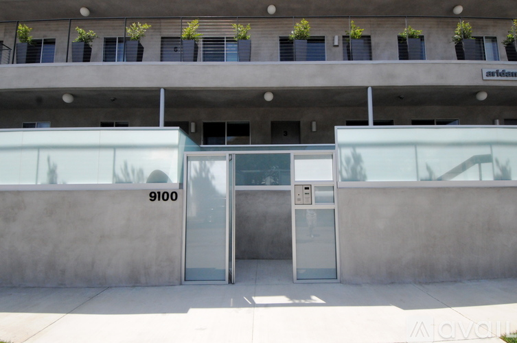 The image shows a building with the number 9100 on it.