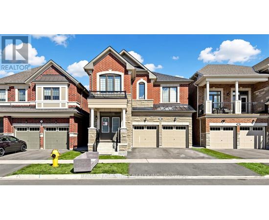 A row of houses with garages and a fire hydrant in front.