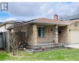 A house with a brown roof and a sign that says "1279" on it.