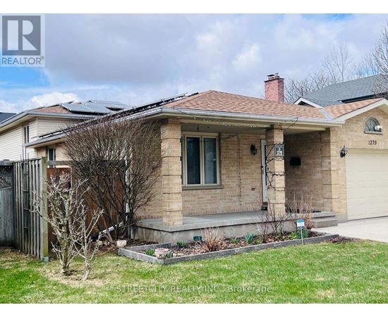 A house with a brown roof and a sign that says "1279" on it.