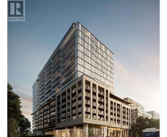 A modern building with a glass facade is depicted in the image.