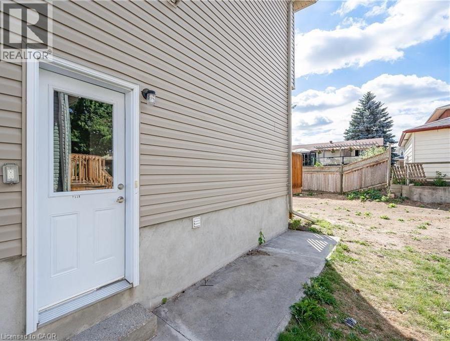 A house with a white door and a small porch.