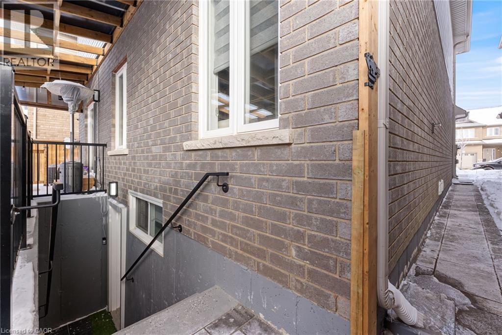 A brick building with a window and a door.