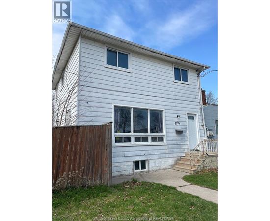 A house with the number 8055 on the front door.