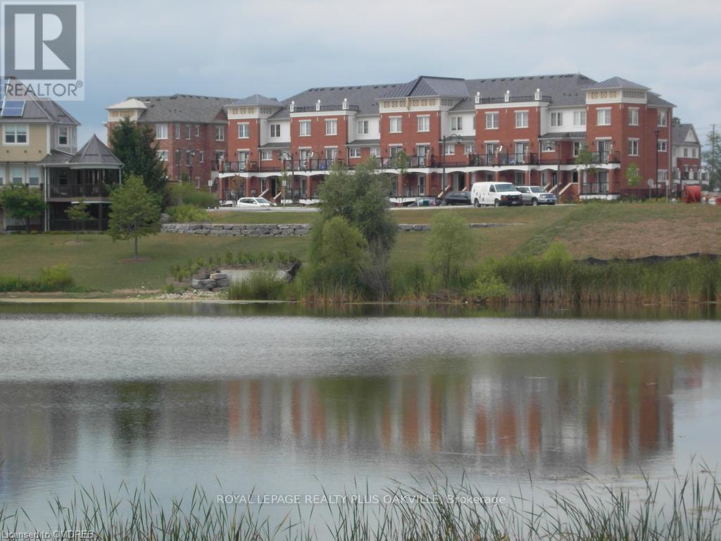 A large building with a lake in front of it.