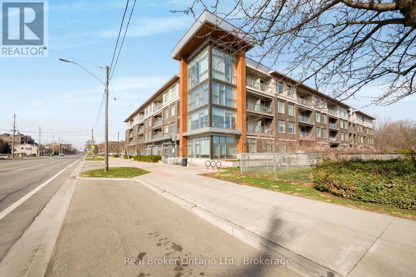 A building with a Real Broker Ontario Ltd. sign in Brokers.
