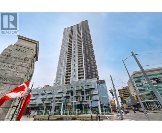 A tall building with a sign that reads "ARMY" in front of it.
