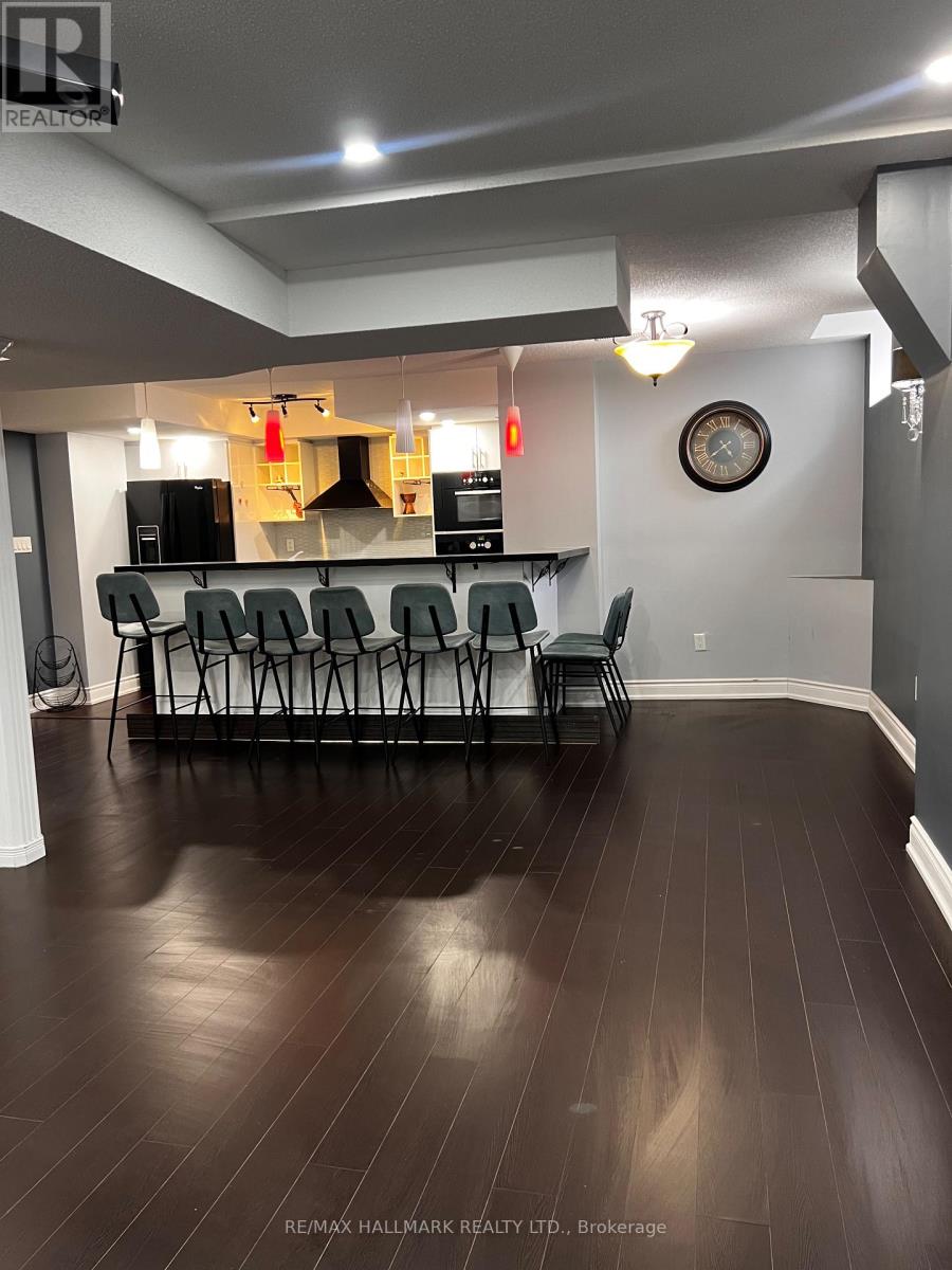 A room with a long table and chairs.