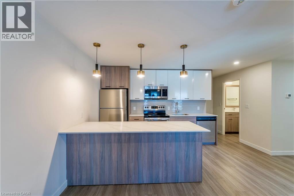 A modern kitchen with a large island in the middle.