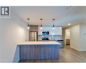 A modern kitchen with a large island in the middle.