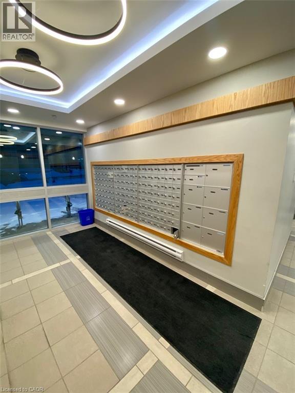 A realtor's office with a large board of contact information.