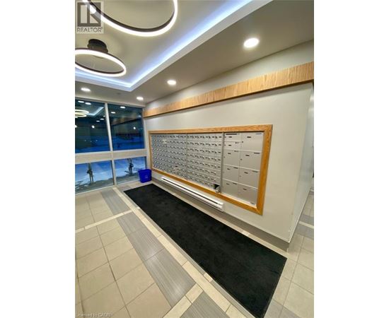 A realtor's office with a large board of contact information.
