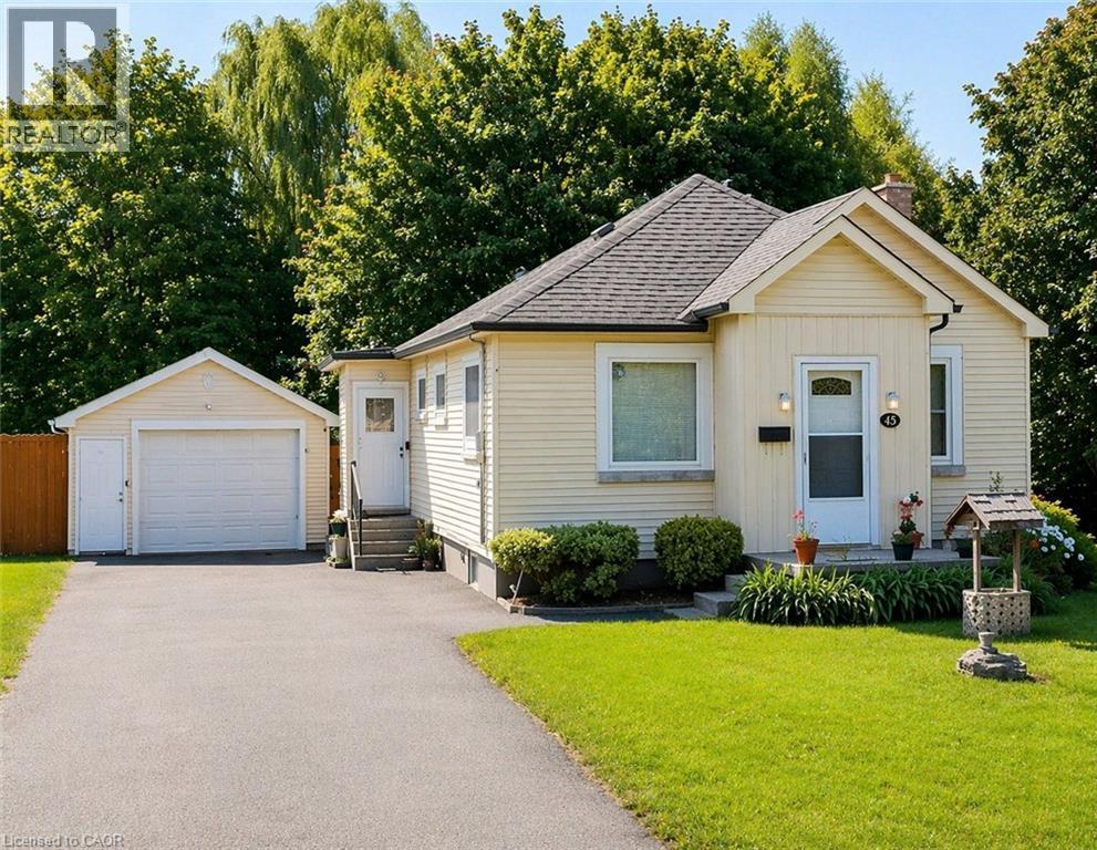 A house with a white door and a garage door.