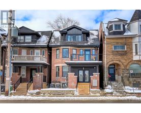 A row of houses with different architectural designs.