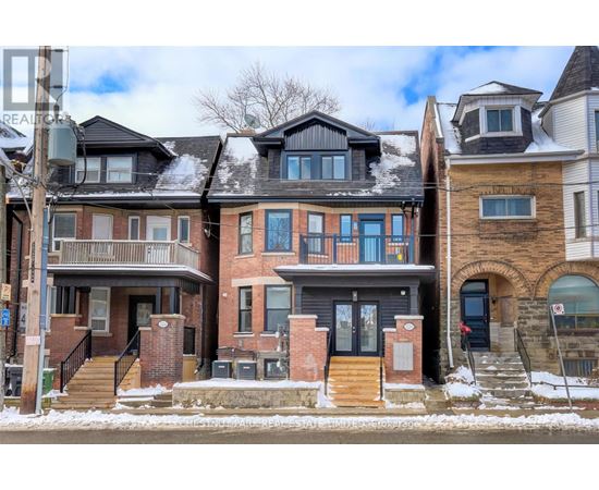 A row of houses with different architectural designs.
