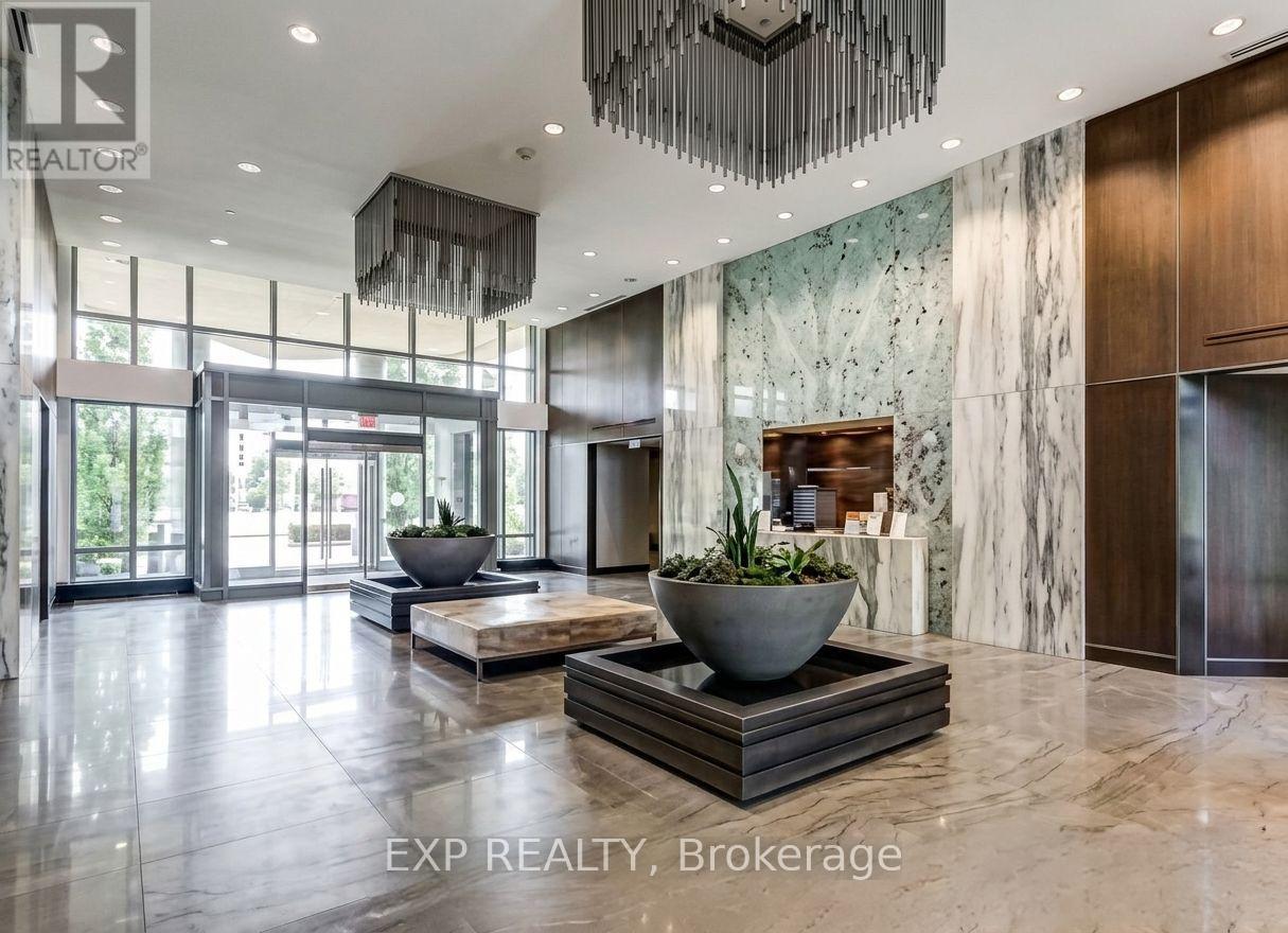 A large, modern living room with a marble floor and a large window.