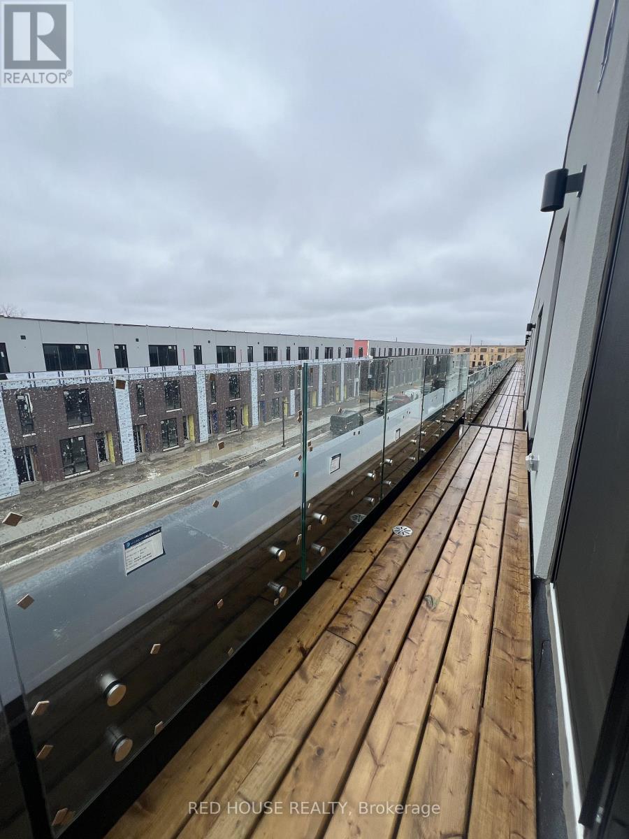 A view from a balcony looking down at a building under construction.