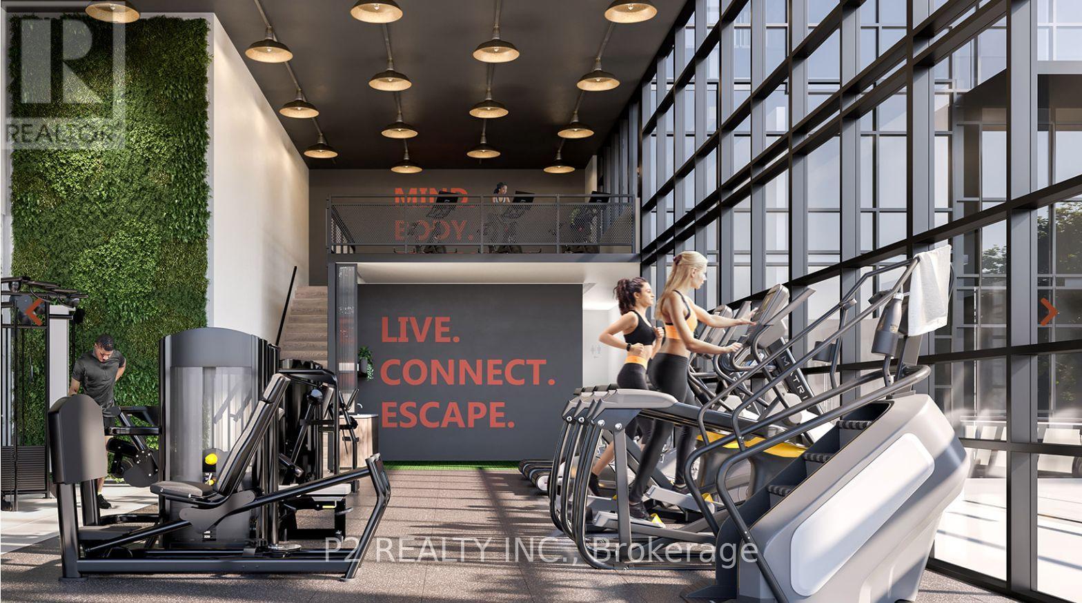 A gym with a green wall and a sign that says "Live. Connect. Escape."