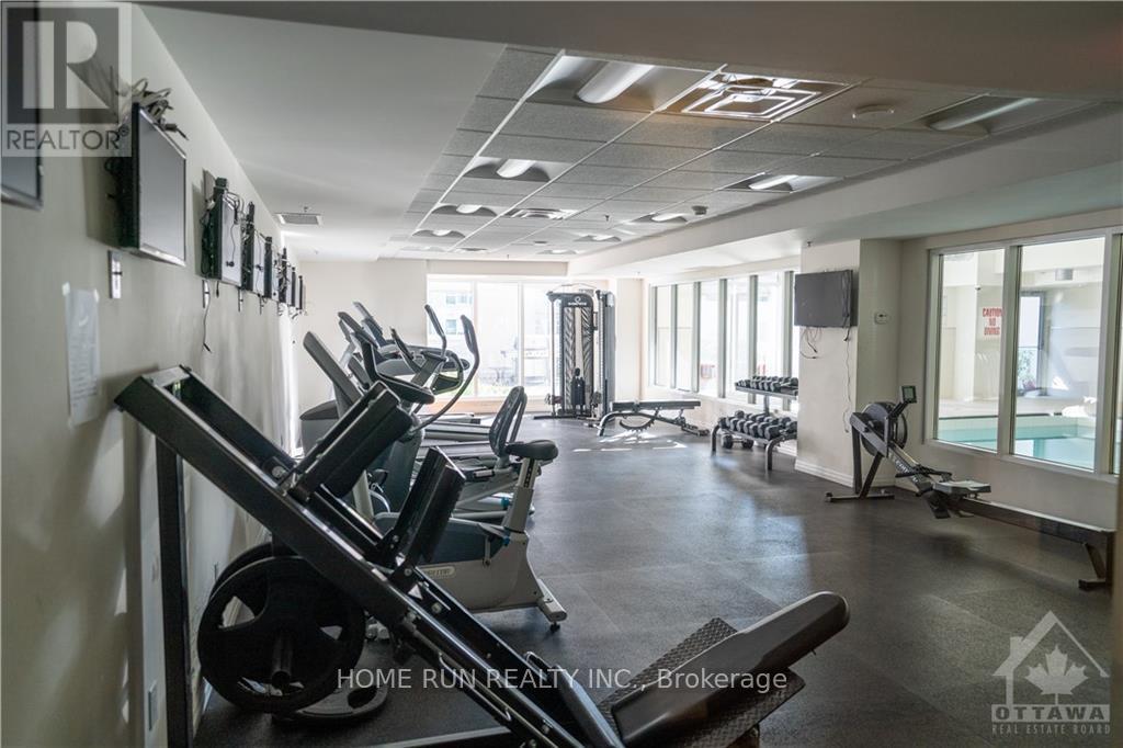 A gym with treadmills, elliptical machines and other cardio equipment.