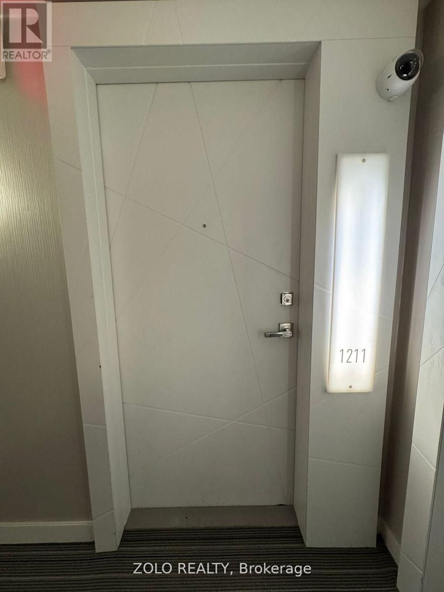 A white door with a number 1271 on it.