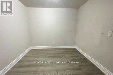 A room with a staircase leading to the second floor.