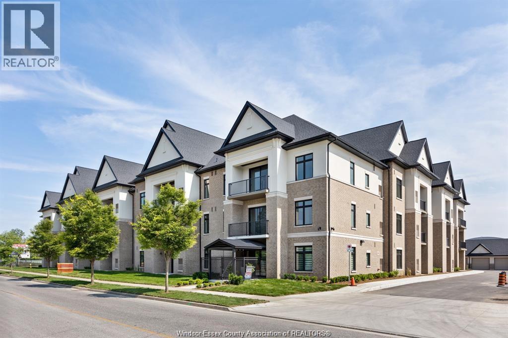 A large, modern apartment complex with multiple buildings and balconies.