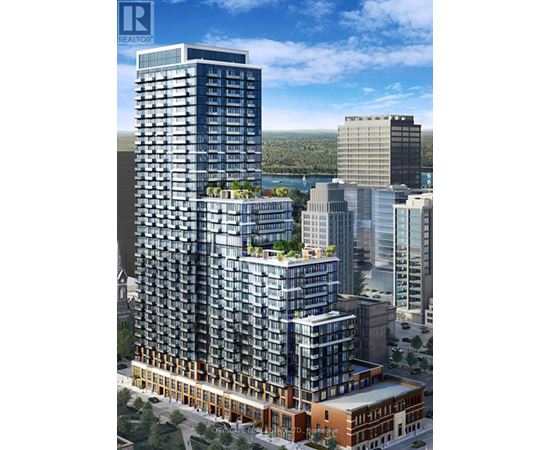 A tall building with a lot of windows is under construction.