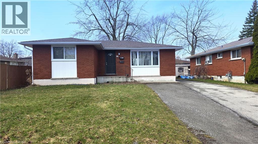 A house with a white garage door is for sale.